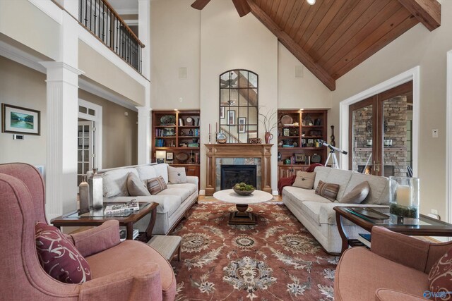 13032 Monte Vedra Rd, Huntsville, AL 35803 - living area with a ceiling fan, french doors, decorative columns, a fireplace, and high vaulted ceiling