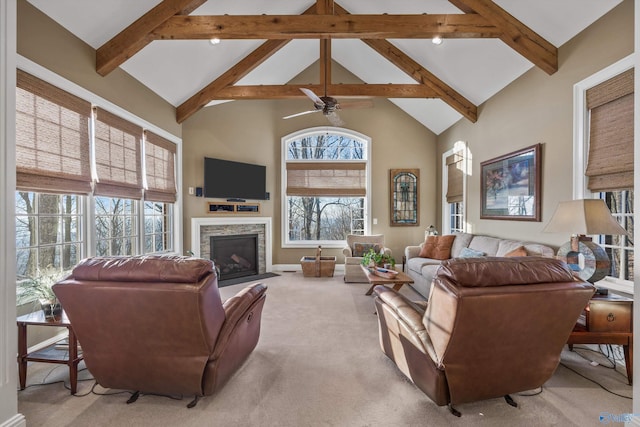 13032 Monte Vedra Rd, Huntsville, AL 35803 - living room with light carpet, beamed ceiling, a fireplace, high vaulted ceiling, and ceiling fan