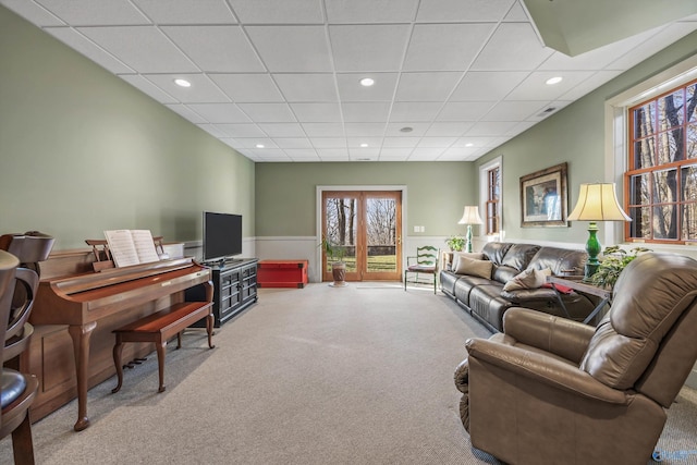 13032 Monte Vedra Rd, Huntsville, AL 35803 - carpeted living area featuring wainscoting, visible vents, recessed lighting, and a drop ceiling