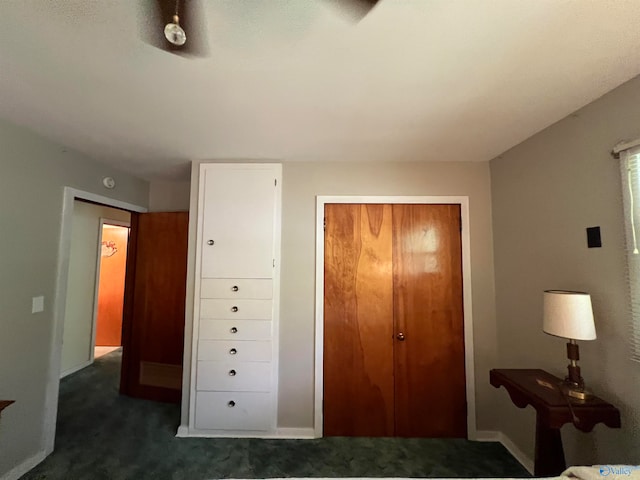 carpeted bedroom with a closet