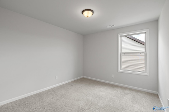 view of carpeted spare room