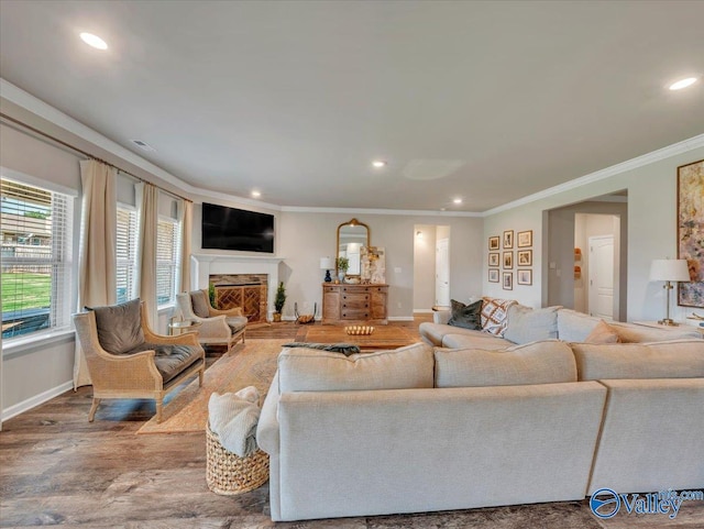 266 Dinner Tree Sq, Huntsville, AL 35811 - living area with ornamental molding, recessed lighting, wood finished floors, a fireplace, and baseboards