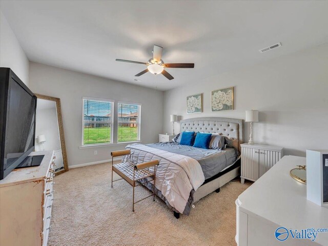 266 Dinner Tree Sq, Huntsville, AL 35811 - bedroom with light carpet, ceiling fan, and baseboards