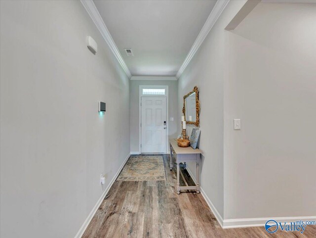 266 Dinner Tree Sq, Huntsville, AL 35811 - doorway to outside with wood finished floors, baseboards, and ornamental molding
