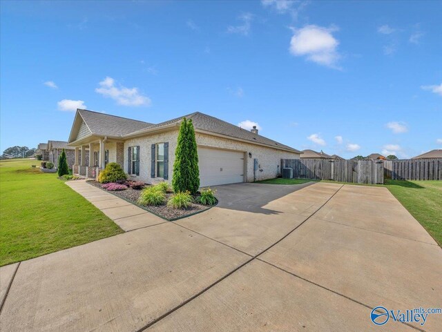266 Dinner Tree Sq, Huntsville, AL 35811 - view of property exterior featuring an attached garage, concrete driveway, and brick siding
