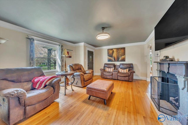 1228 W Market St, Athens, AL 35611 - living area with baseboards, ornamental molding, and light wood-style floors