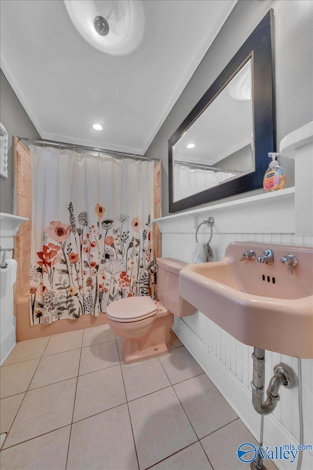 1228 W Market St, Athens, AL 35611 - full bath with a shower with shower curtain, toilet, tile patterned flooring, and crown molding