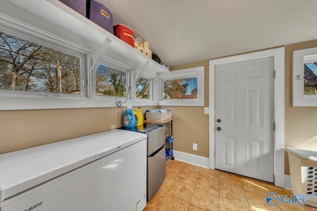 1228 W Market St, Athens, AL 35611 - washroom with light tile patterned floors and baseboards