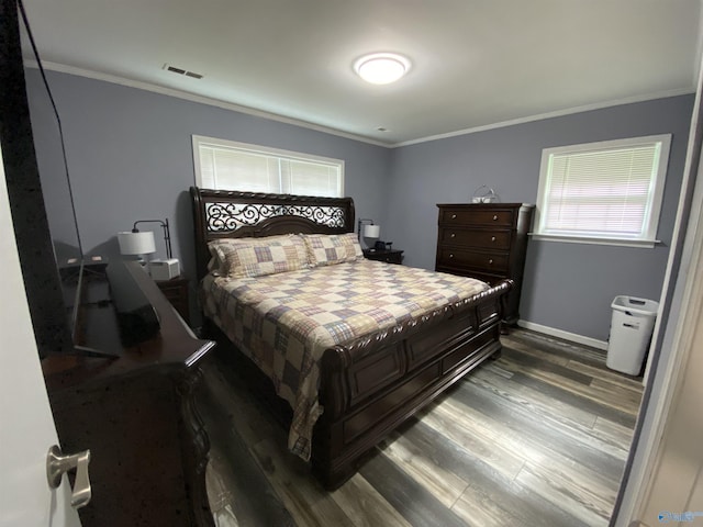 135 Forest Hill Rd, Trinity, AL 35673 - bedroom featuring dark wood finished floors, multiple windows, crown molding, and baseboards