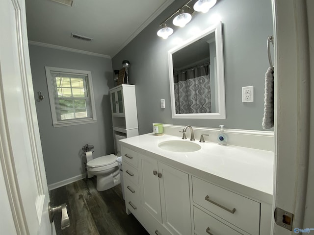 135 Forest Hill Rd, Trinity, AL 35673 - bathroom featuring vanity, toilet, wood finished floors, crown molding, and baseboards
