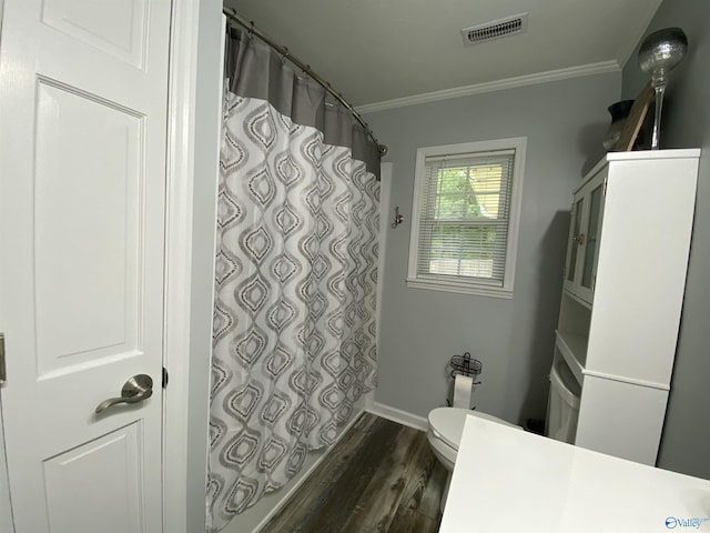 135 Forest Hill Rd, Trinity, AL 35673 - full bathroom with ornamental molding, wood finished floors, toilet, vanity, and curtained shower