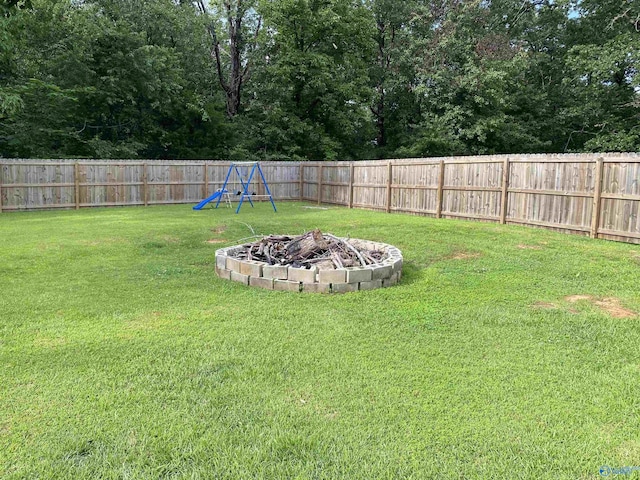 135 Forest Hill Rd, Trinity, AL 35673 - view of yard featuring an outdoor fire pit