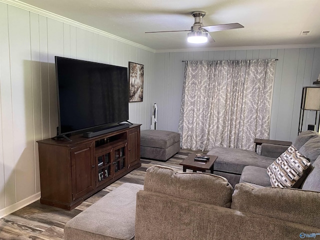 135 Forest Hill Rd, Trinity, AL 35673 - living room with crown molding, wood finished floors, a ceiling fan, and baseboards