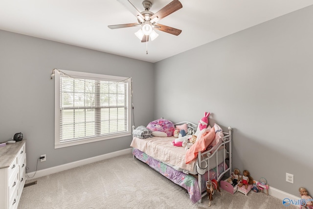15153 Hobbs Rd, Athens, AL 35614 - bedroom featuring light colored carpet, baseboards, a ceiling fan, and visible vents
