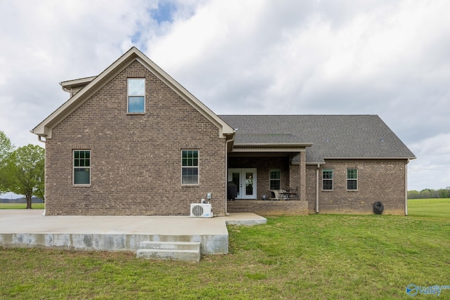 15153 Hobbs Rd, Athens, AL 35614 - back of house featuring a yard, french doors, brick siding, and a patio