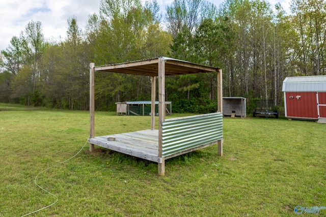 15153 Hobbs Rd, Athens, AL 35614 - view of yard featuring an outbuilding and a storage unit