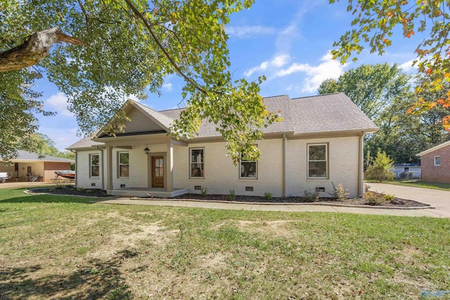 view of front of home featuring a front yard