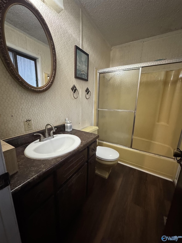 full bath with wallpapered walls, wood finished floors, and a textured ceiling