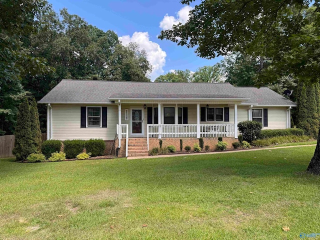 single story home featuring a front yard and covered porch