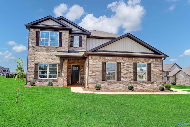 craftsman-style house with a front yard