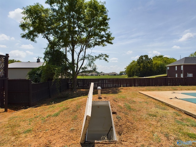 view of yard featuring a fenced backyard