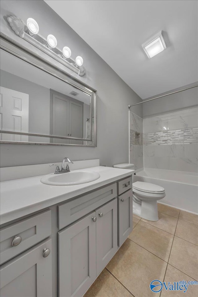 full bathroom featuring bathing tub / shower combination, vanity, toilet, and tile patterned floors