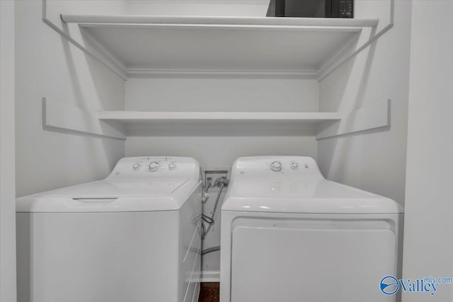 washroom with laundry area and separate washer and dryer