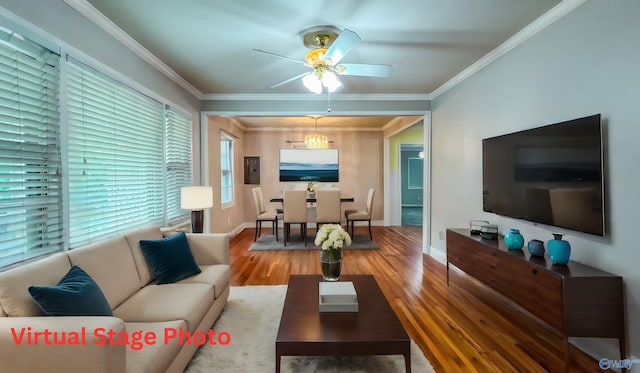 living room featuring ceiling fan, ornamental molding, and wood-type flooring