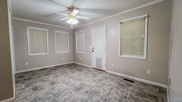 unfurnished bedroom with ceiling fan and ornamental molding