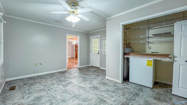 laundry room with ornamental molding, washer hookup, and ceiling fan