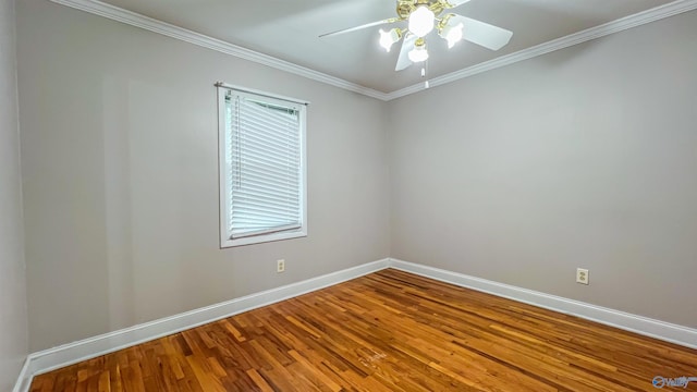 spare room featuring hardwood / wood-style flooring, ceiling fan, and ornamental molding