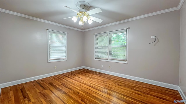 unfurnished room with crown molding, ceiling fan, and hardwood / wood-style flooring