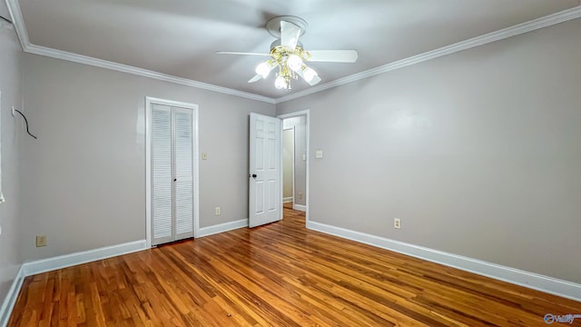 unfurnished bedroom with crown molding, ceiling fan, and light hardwood / wood-style floors