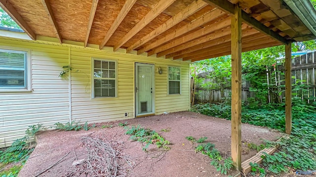 property entrance featuring a patio