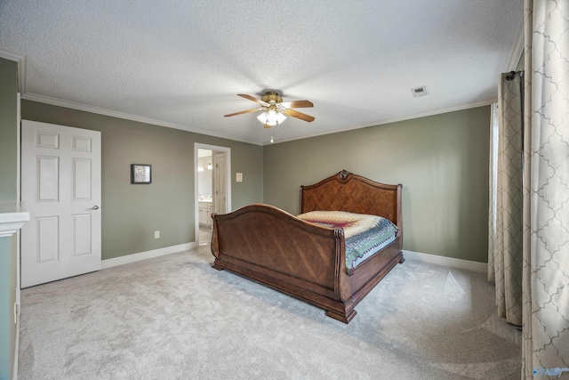 carpeted bedroom with ornamental molding, a textured ceiling, and baseboards