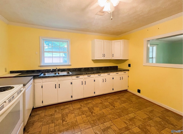 kitchen with a sink, white cabinetry, dark countertops, white appliances, and crown molding
