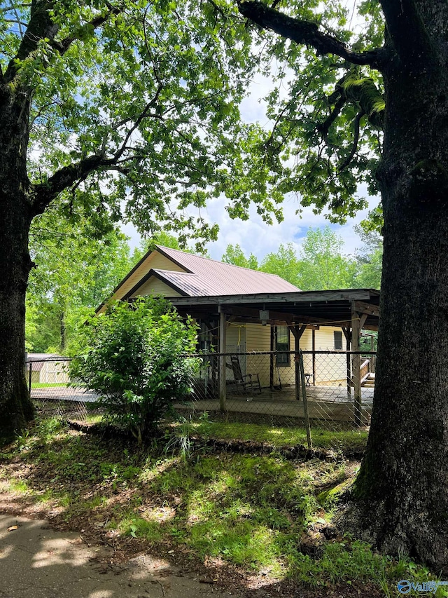 view of front of house with fence