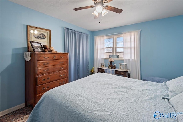 bedroom featuring ceiling fan