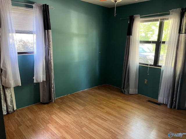 136 Atnip Dr, Scottsboro, AL 35769 - spare room with light wood-style floors and ceiling fan