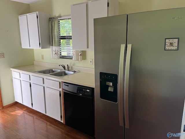 136 Atnip Dr, Scottsboro, AL 35769 - kitchen featuring stainless steel fridge with ice dispenser, black dishwasher, a sink, light countertops, and dark wood finished floors