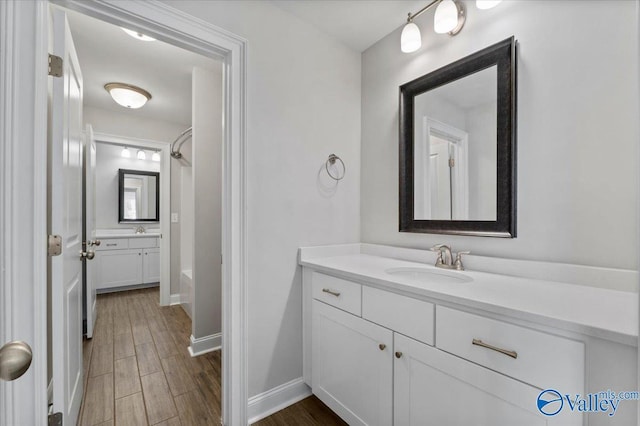 bathroom with shower / bathing tub combination and vanity