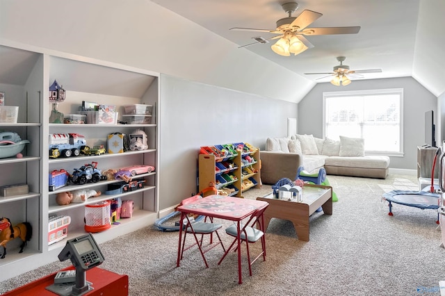 rec room featuring carpet flooring and vaulted ceiling