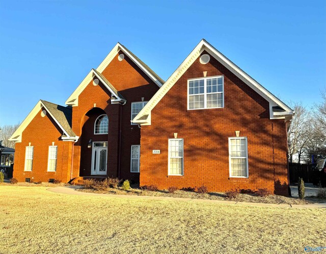 exterior space with a front lawn
