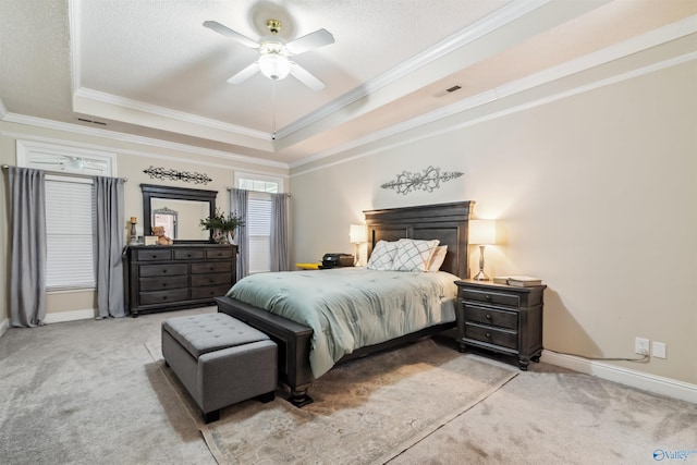 15037 SE Ashmont Blvd, Huntsville, AL 35803 - carpeted bedroom with a raised ceiling, crown molding, and ceiling fan