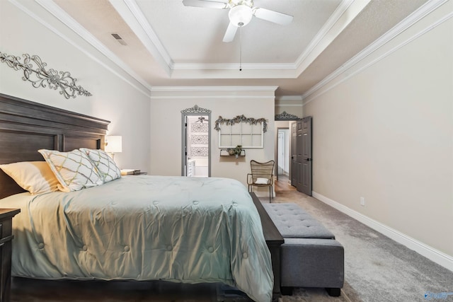 15037 SE Ashmont Blvd, Huntsville, AL 35803 - carpeted bedroom with a raised ceiling, crown molding, and ceiling fan