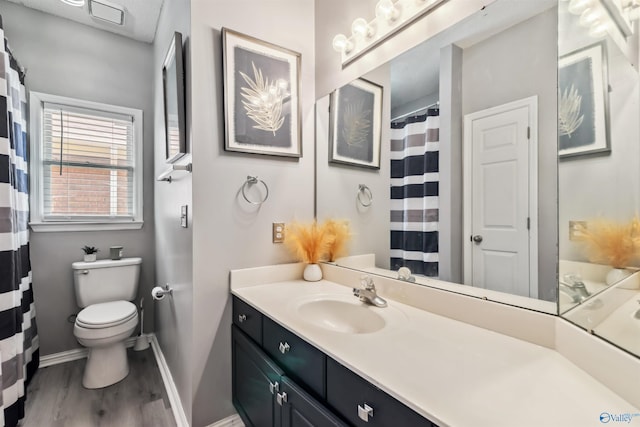 15037 SE Ashmont Blvd, Huntsville, AL 35803 - bathroom featuring wood finished floors and vanity