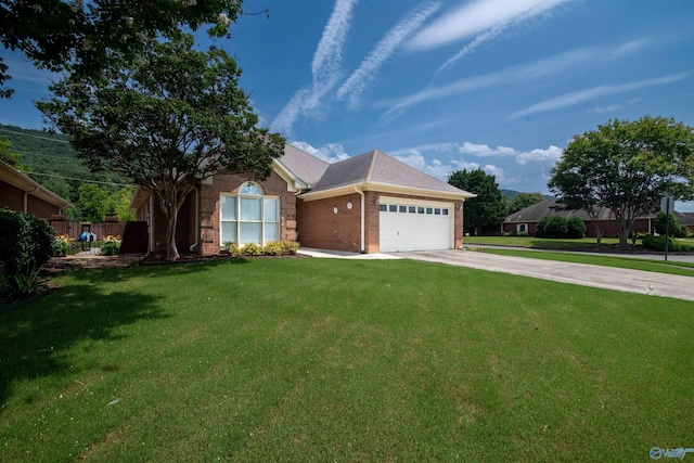 15037 SE Ashmont Blvd, Huntsville, AL 35803 - view of front of home featuring concrete driveway, brick siding, and an attached garage