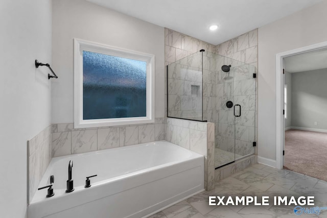 bathroom featuring a shower stall, a bath, recessed lighting, marble finish floor, and baseboards