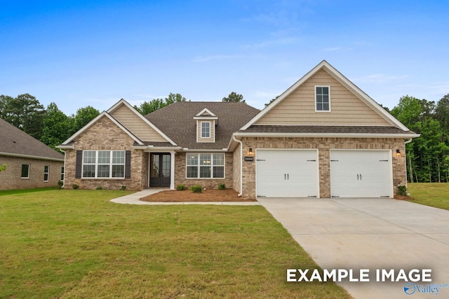 craftsman-style house with a garage and a front lawn