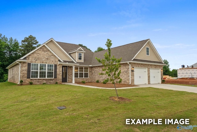 craftsman house with a garage, roof with shingles, a front yard, brick siding, and concrete driveway